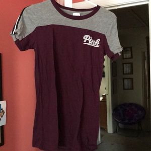 Purple and gray t-shirt.